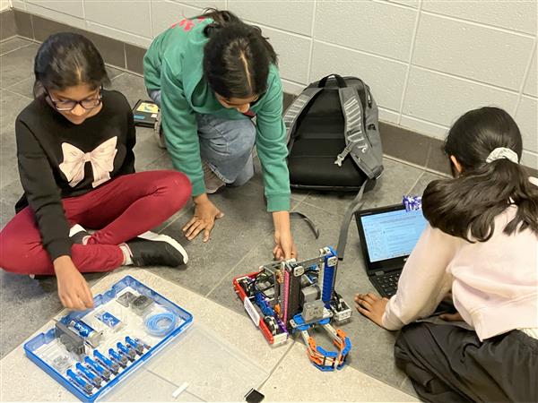 Students working on a robot.